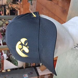 Nike Iowa Hawkeyes black performance adjustable hat featuring the team logo